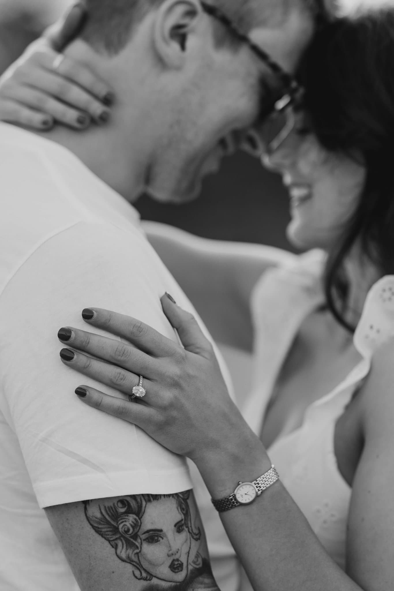 Ed and Migle embracing, black and white